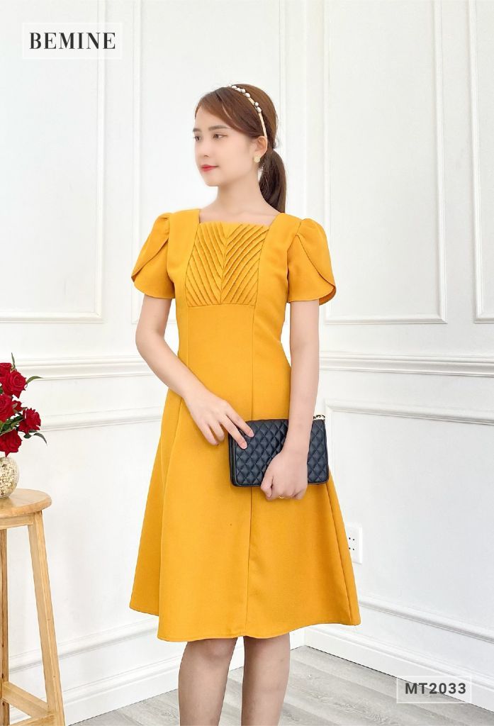 MT2033VANG - Đầm sếp ly ngực tùng xòe