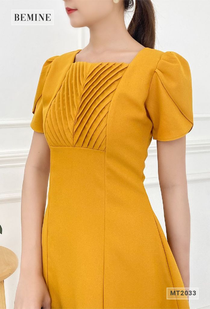 MT2033VANG - Đầm sếp ly ngực tùng xòe
