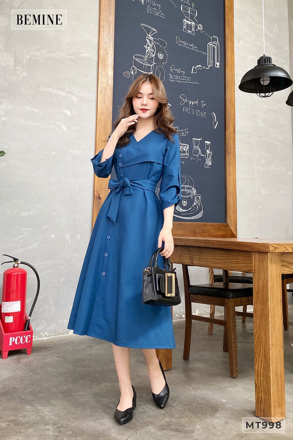 MT998XANH - Đầm xanh đáp ngực đính nút