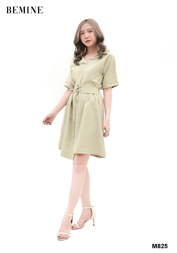 M825 - Đầm xanh chỉ thun eo đính nút