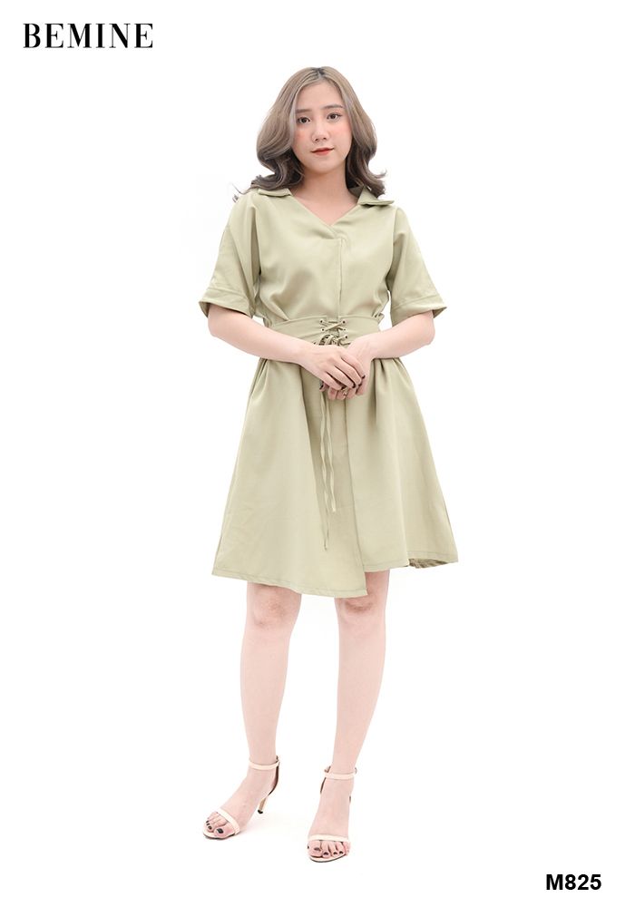 M825 - Đầm xanh chỉ thun eo đính nút