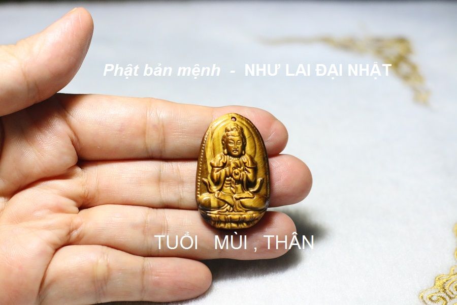 Phật bản mệnh đá mắt hổ 3,5x2,5 cm tuổi Mùi và tuổi Thân là Như Lai Đại Nhật