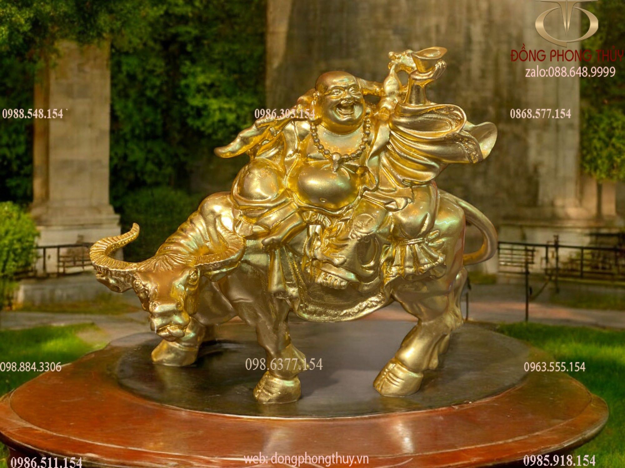 Tượng di lặc cưỡi trâu bằng đồng thếp vàng 24k