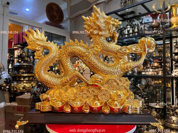 Tượng rồng đế tiền dát vàng 24k