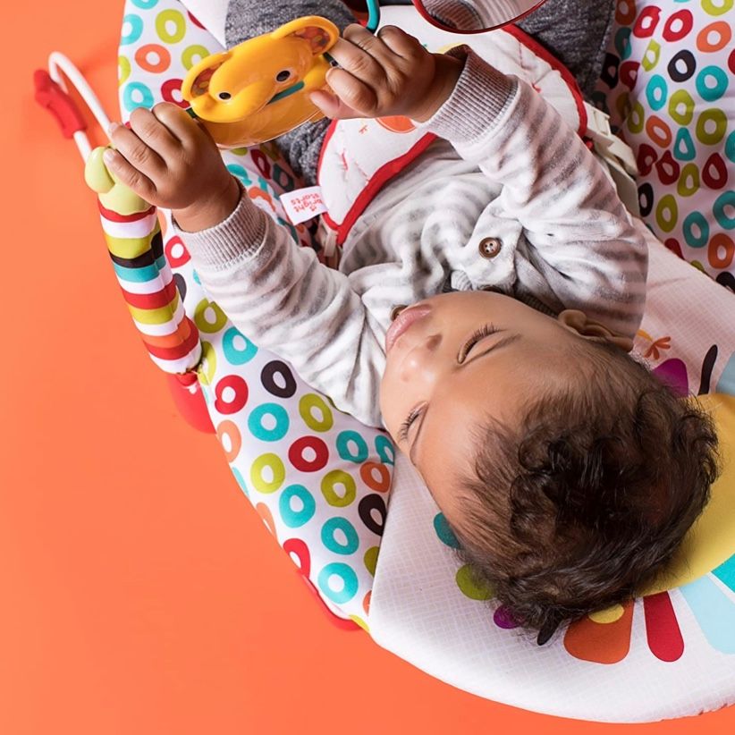 Ghế cho bé Bright Starts Playful Pinwheels Bouncer