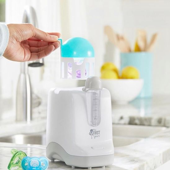 Máy làm ấm sữa The First Years 2-in-1 Simple Serve Bottle Warmer