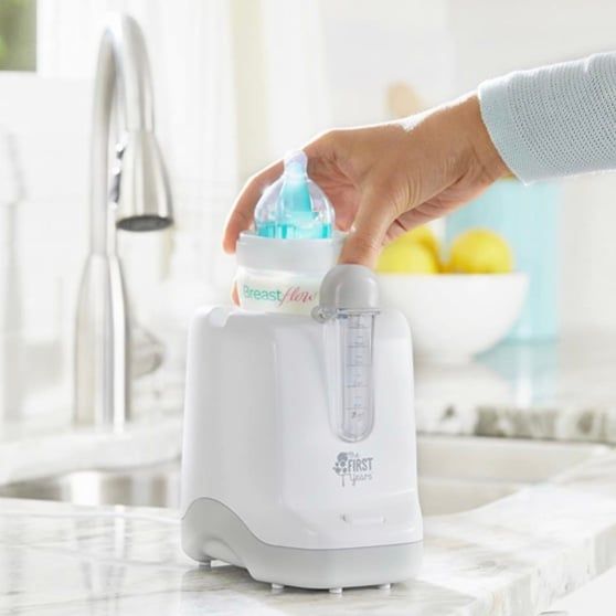 Máy làm ấm sữa The First Years 2-in-1 Simple Serve Bottle Warmer