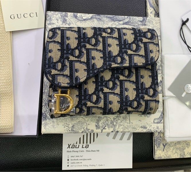 Dior saddle wallet