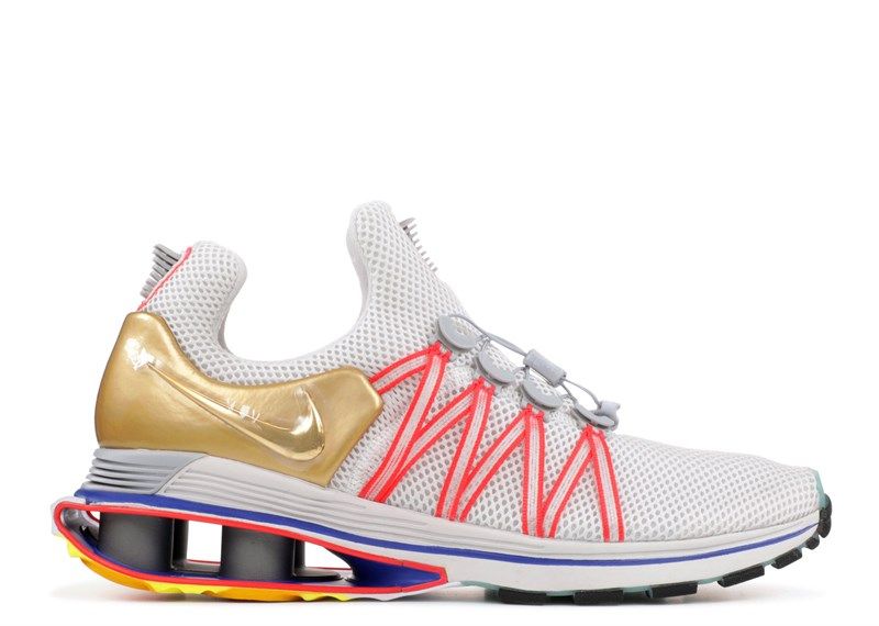 NIKE SHOX GRAVITY ''METALLIC GOLD''