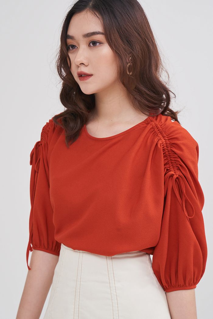 Áo cổ tròn rút dây tay lỡ