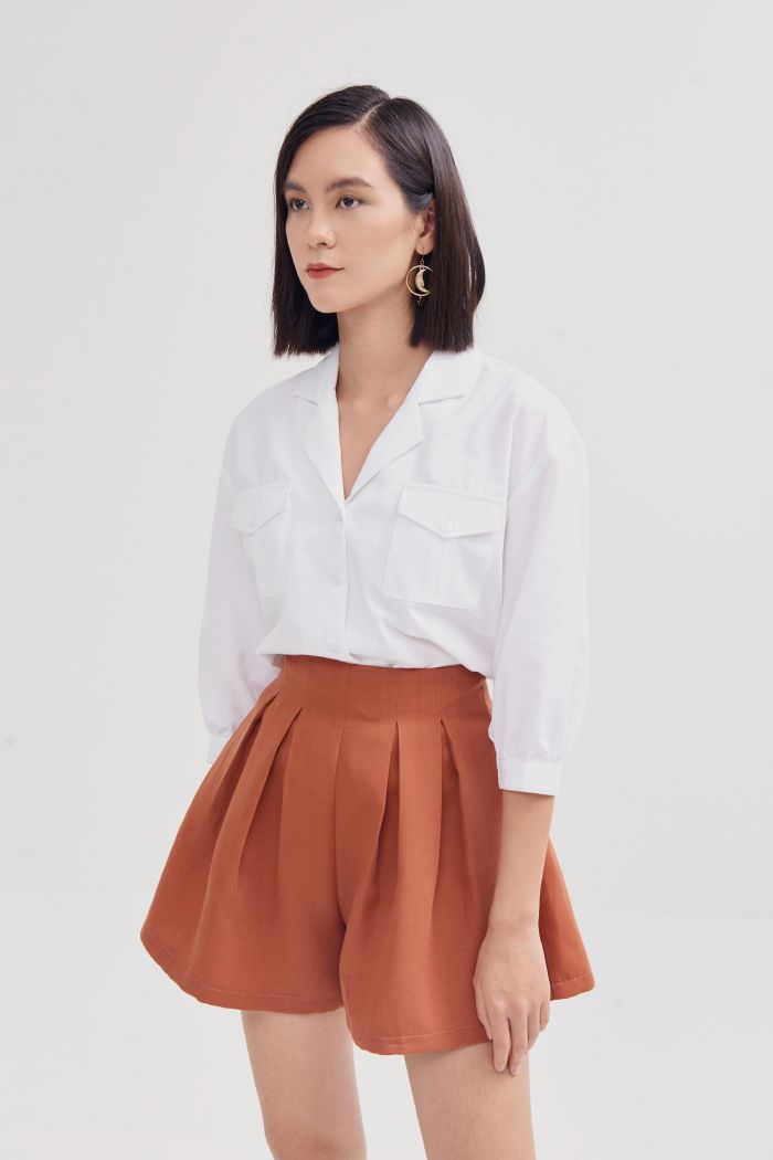 Quần váy xếp li hợp tròn