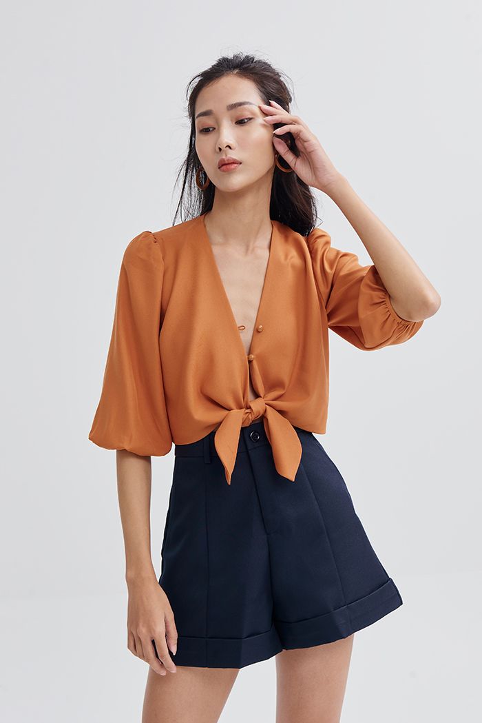 Áo croptop tay lở cột nơ trước đi biển ss19