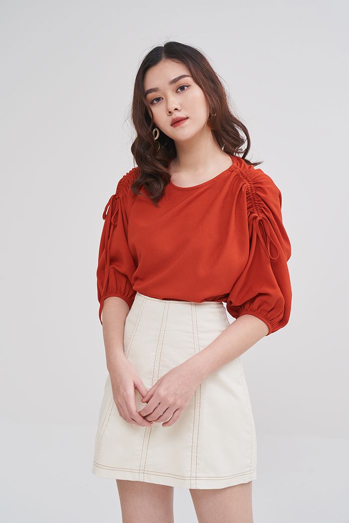 Áo cổ tròn rút dây tay lỡ