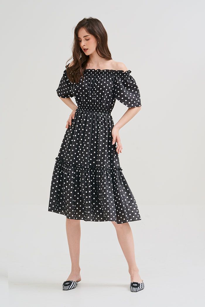 Đầm linen chấm bi midi rã tùng nhún thun