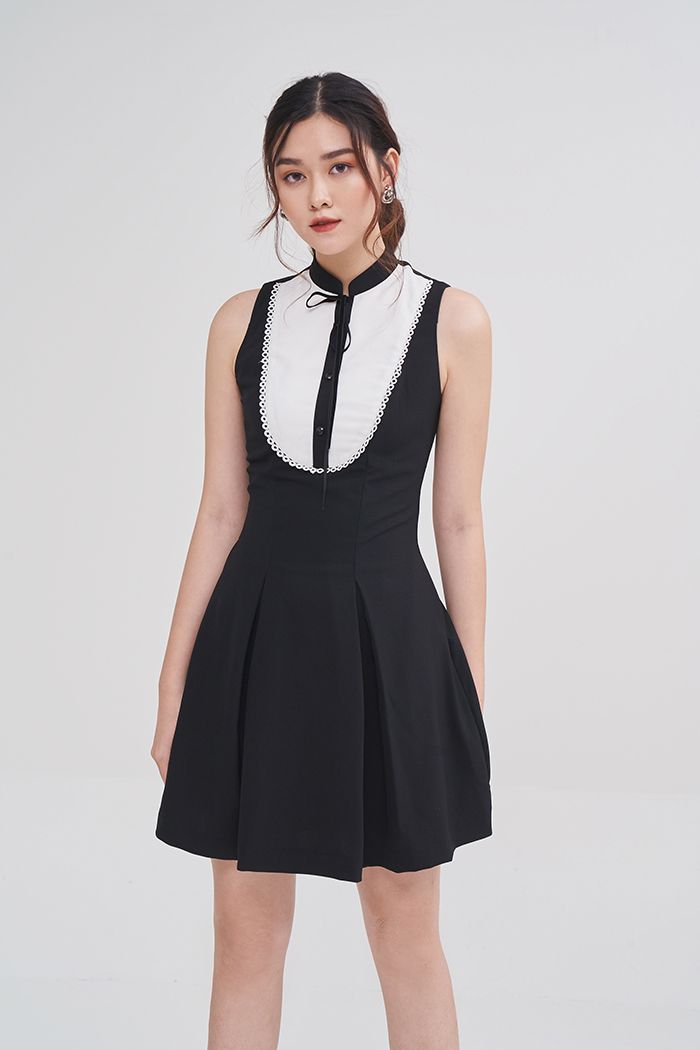 Đầm sát nách phối màu rã ngực cột ribbon