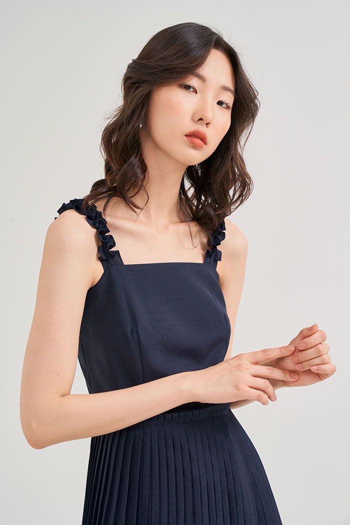 Đầm 2 dây midi dập li tùng