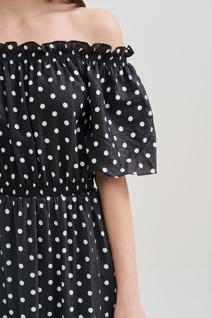 Đầm linen chấm bi midi rã tùng nhún thun