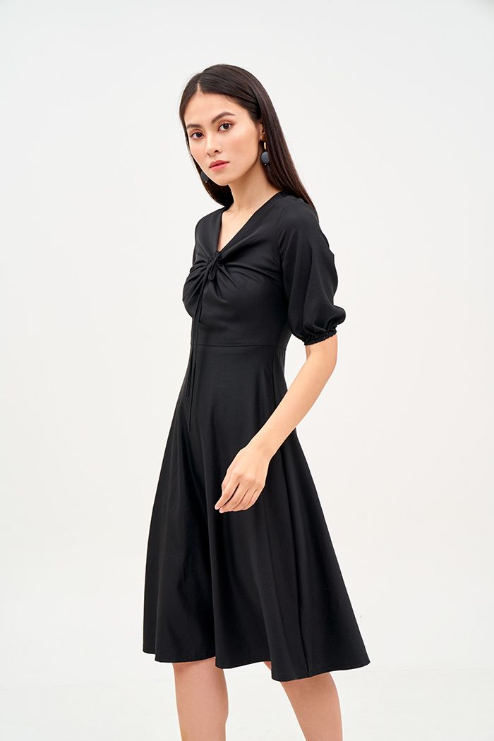 Đầm midi tay lở rút tròn cột nơ ngực