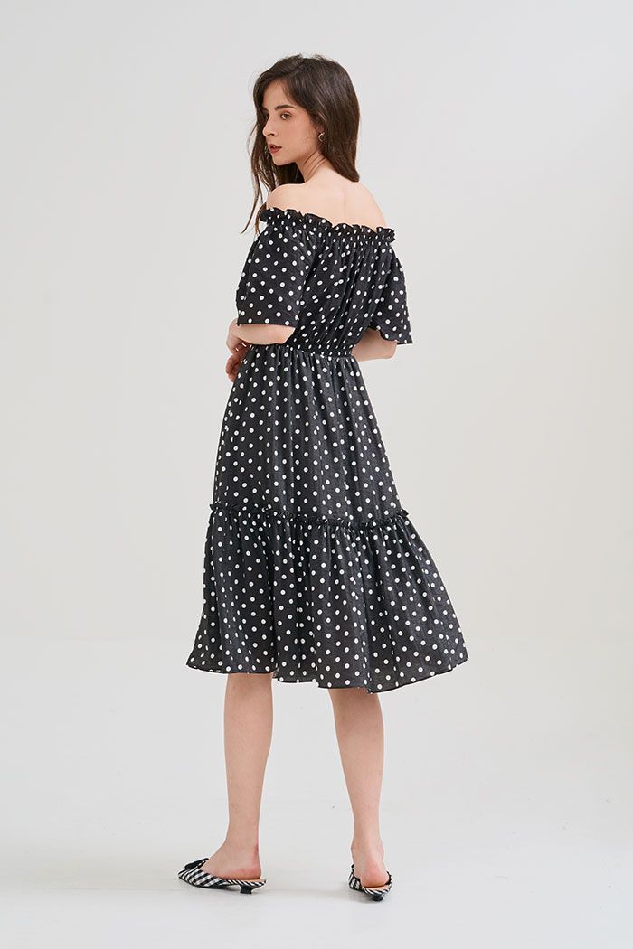 Đầm linen chấm bi midi rã tùng nhún thun