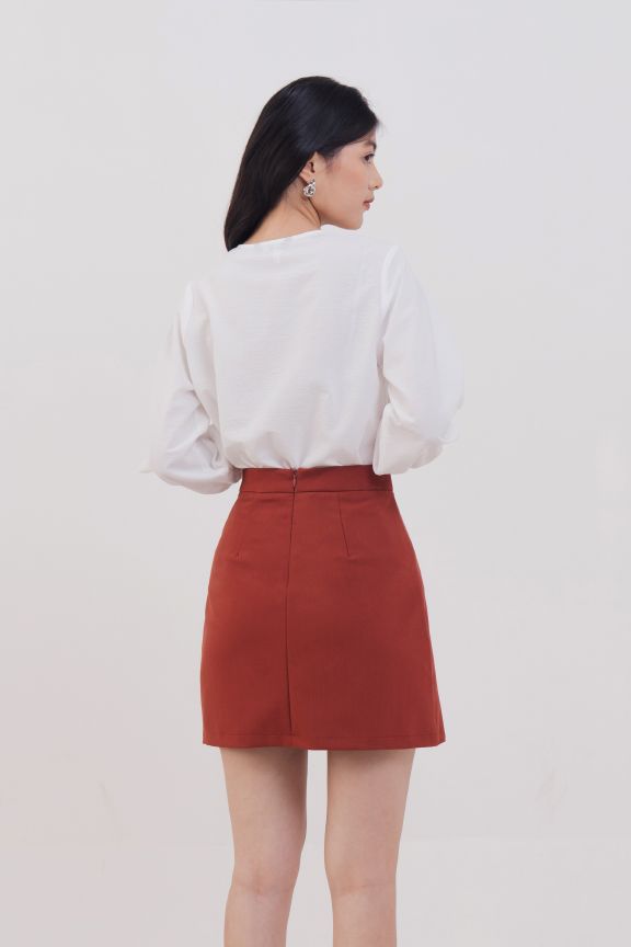 Váy tùng A thêu hoa nhấn túi