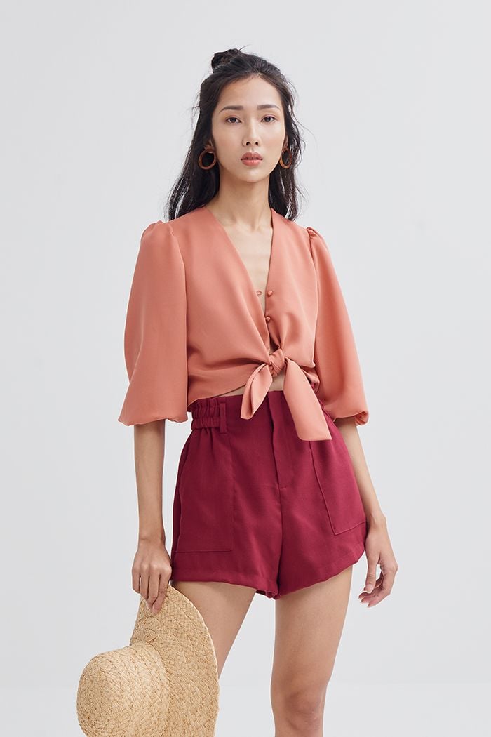 Áo croptop tay lở cột nơ trước đi biển ss19