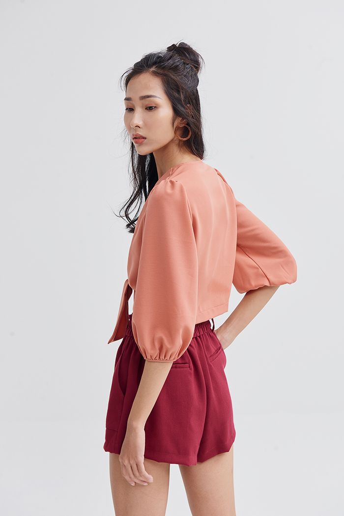 Áo croptop tay lở cột nơ trước đi biển ss19