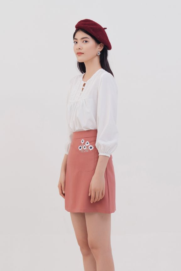 Váy tùng A thêu hoa nhấn túi
