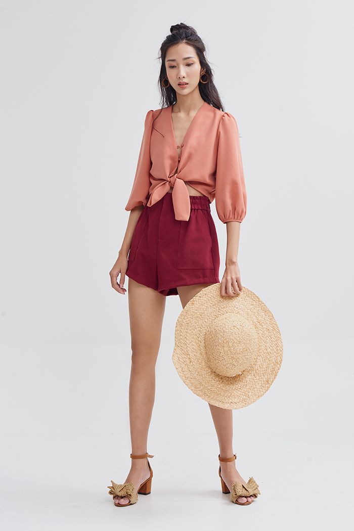 Áo croptop tay lở cột nơ trước đi biển ss19