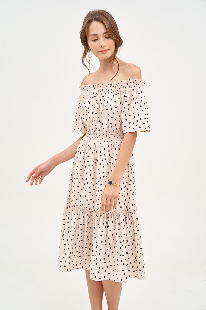 Đầm linen chấm bi midi rã tùng nhún thun