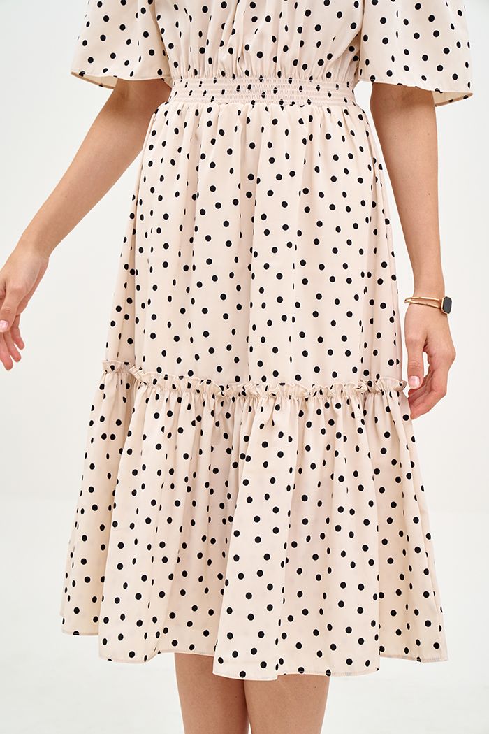 Đầm linen chấm bi midi rã tùng nhún thun