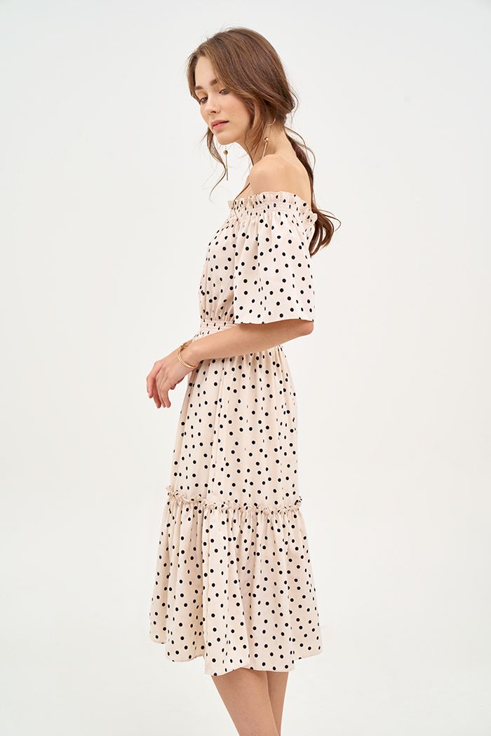 Đầm linen chấm bi midi rã tùng nhún thun