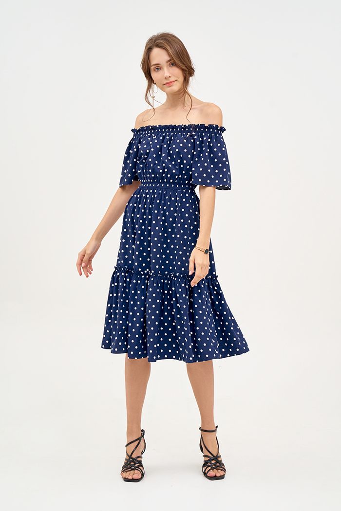 Đầm linen chấm bi midi rã tùng nhún thun