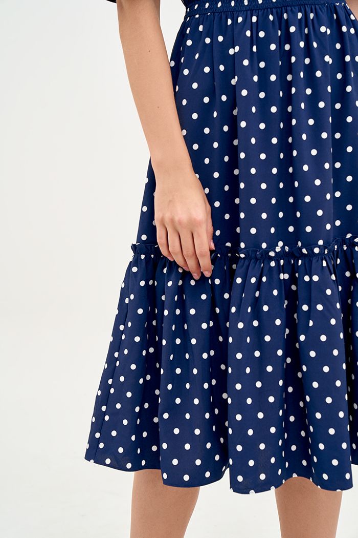 Đầm linen chấm bi midi rã tùng nhún thun