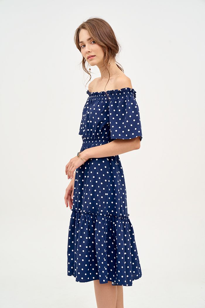Đầm linen chấm bi midi rã tùng nhún thun