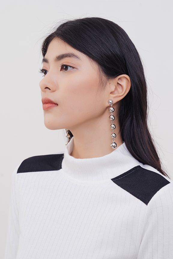Áo thun tay dài dệt kim phối da vai