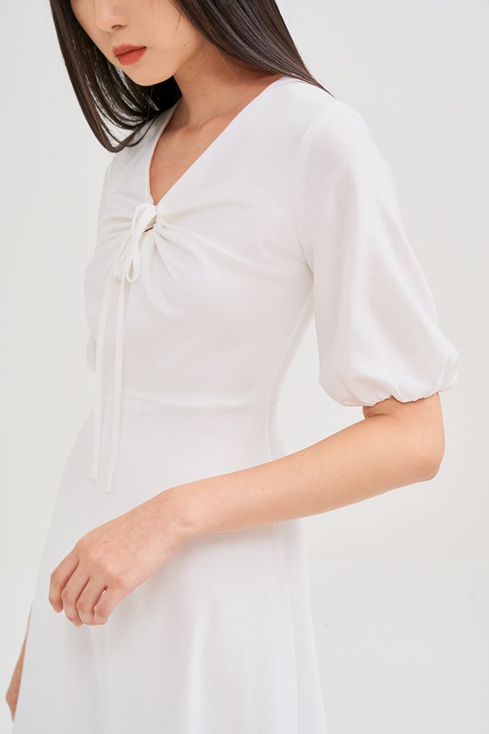 Đầm midi tay lở rút tròn cột nơ ngực