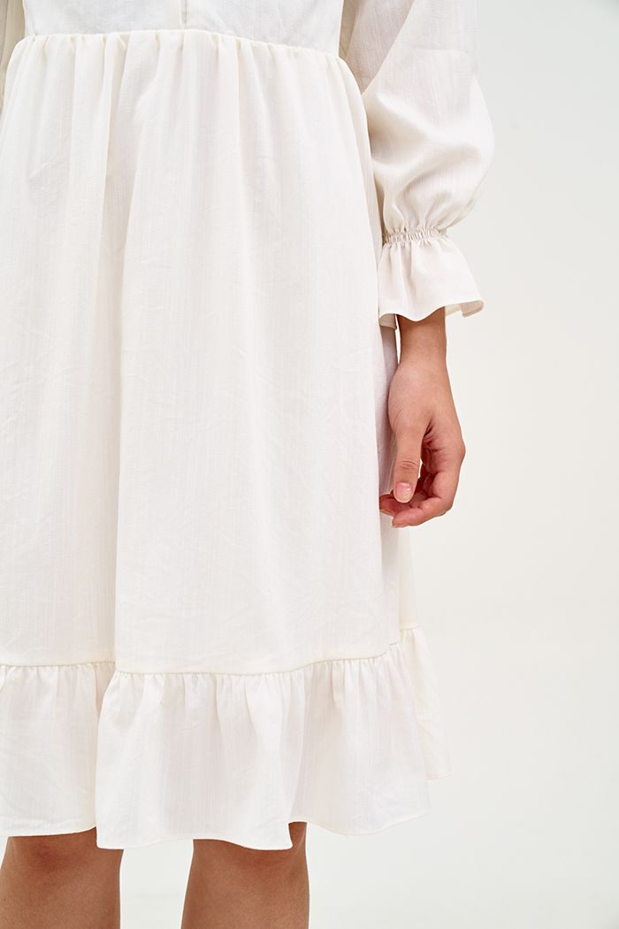 Đầm cotton tay lở nhún bèo xếp li ngực nút bọc