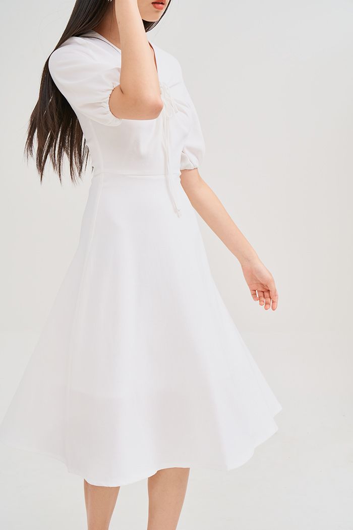 Đầm midi tay lở rút tròn cột nơ ngực