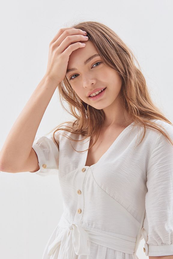 Đầm tay lỡ nhấn nút thắt nơ