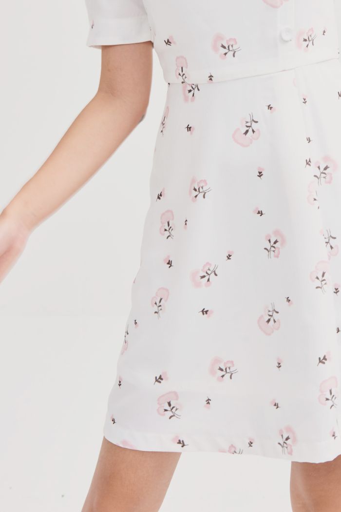 Đầm in hoạ tiết spr19 nhấn nút tay lỡ