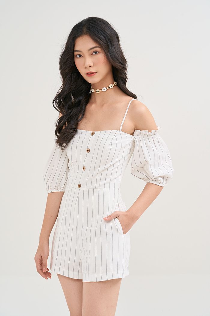 Jumpsuit caro nhấn nẹp nút tay rời