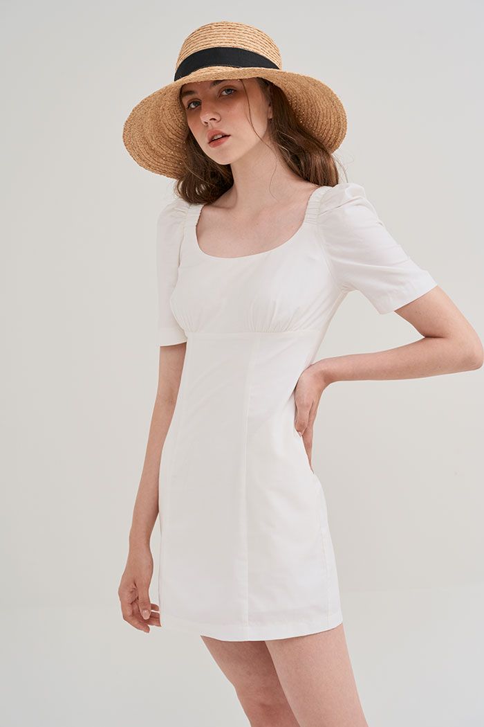 Đầm cotton tay lỡ cổ tròn nhún thun túi chìm