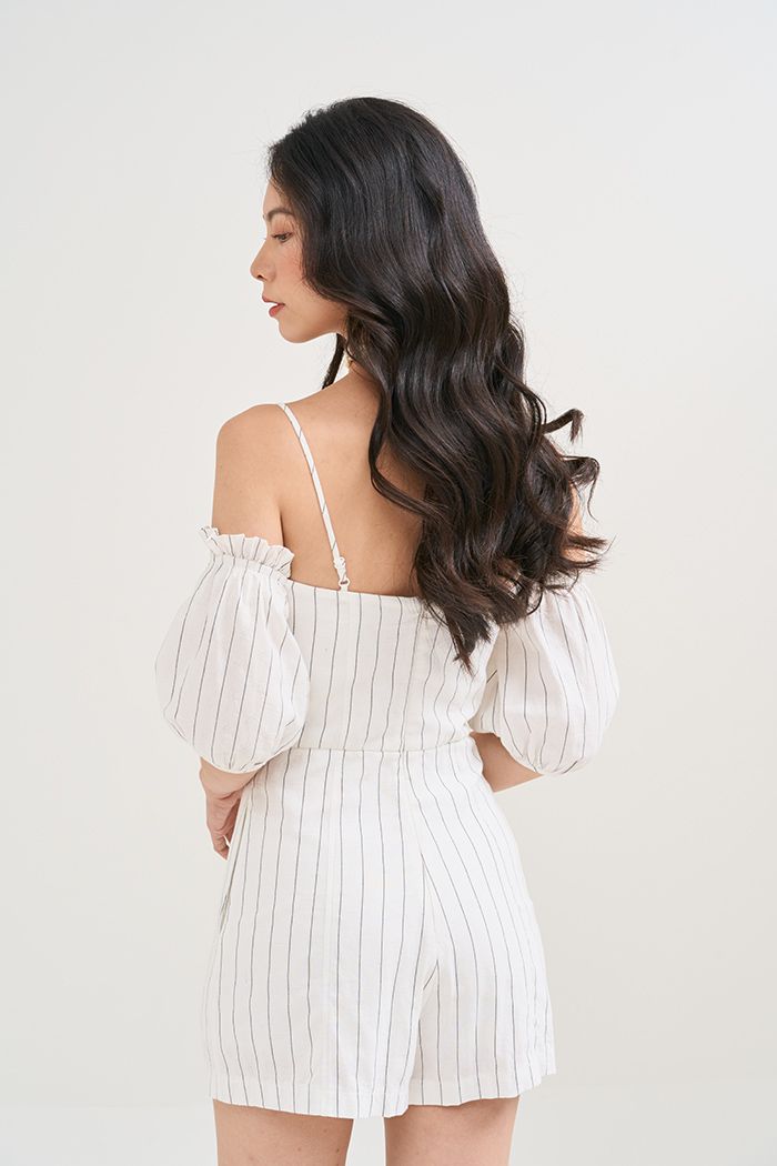 Jumpsuit caro nhấn nẹp nút tay rời