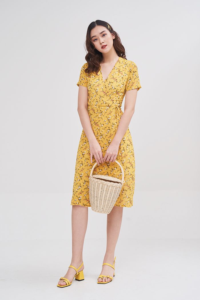 Đầm midi in hoa đắp tùng chéo cột dây nơ