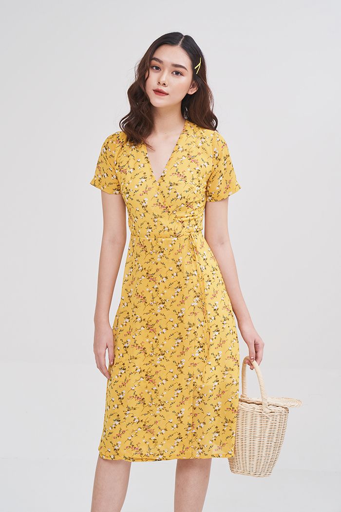 Đầm midi in hoa đắp tùng chéo cột dây nơ