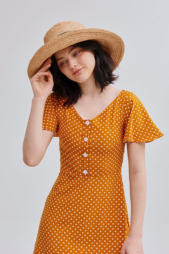 Đầm cổ tim tay con chấm bi nẹp nút