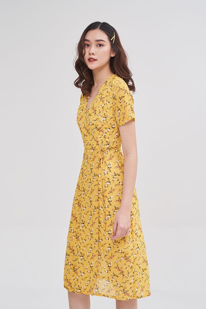 Đầm midi in hoa đắp tùng chéo cột dây nơ