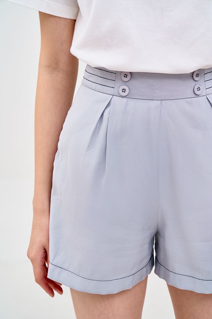 Quần short 4 nút diễu chỉ nỗi
