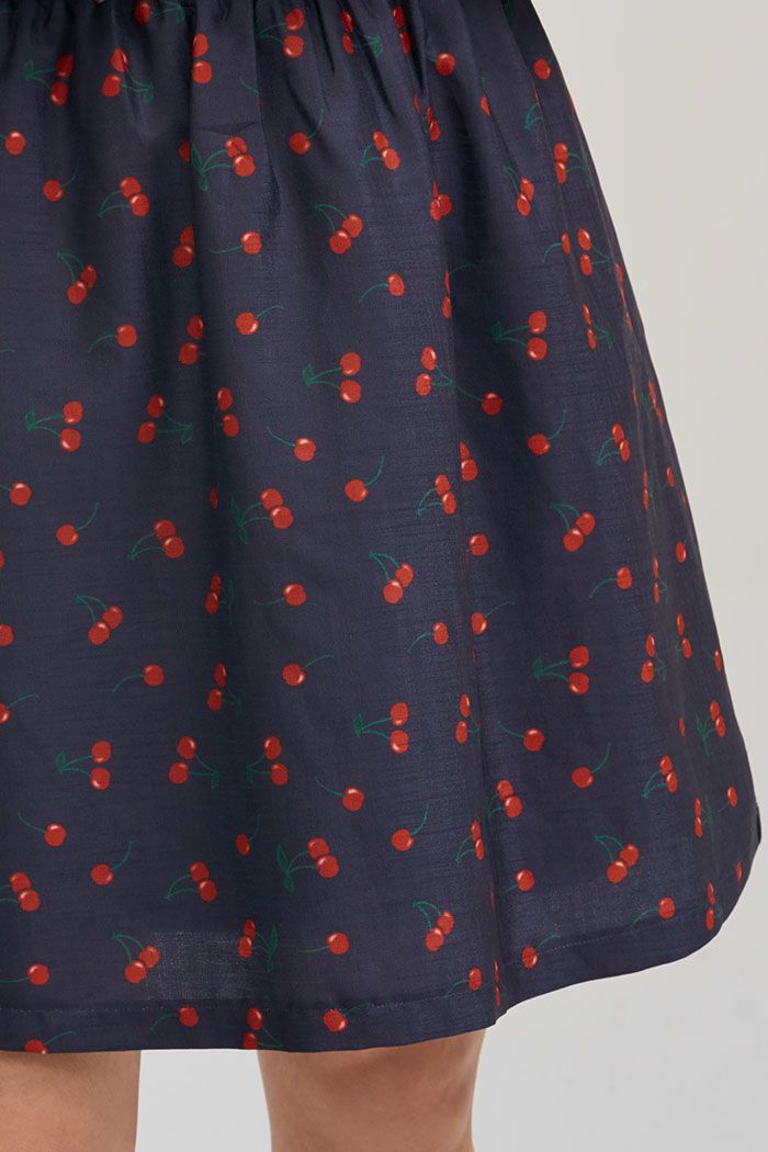 Đầm in hoạ tiết cherry bẹt vai nhún thun