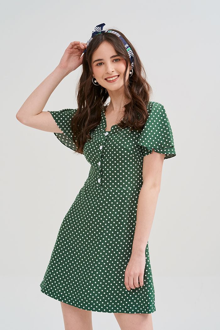 Đầm cổ tim tay con chấm bi nẹp nút